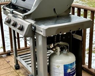 Genesis II E-310 Weber Grill with 3 Burners, Propane in Black and Stainless Steel. Built-In Thermometer.