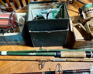 Penn and Luxor Reels shown with  Several Rods  