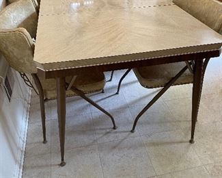 Mid Century Dinette Table with Leaf. 5 Side Chairs. It is Wabash Furniture. With Original Price tag underneath. $24.99!!