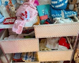 Vintage White Wicker Changing Table with Baby Clothes