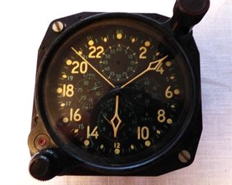 WW II Hamilton H-37500 Elapsed Time Clock.  Designed for the US Navy for use in the F-4U Corsair.  Also used into 1980's on US Navy P-3 Orions.  8 day, 16 Jewel movement with 2 mainsprings.  Has 5 different registers.  See Next Picture