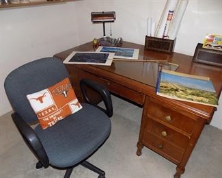 desk and signed military plane photos