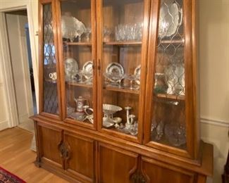 Two-piece lighted china cabinet.