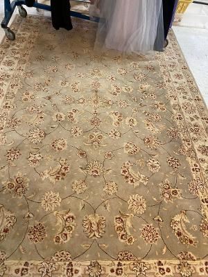 Wool are rug offered for sale
