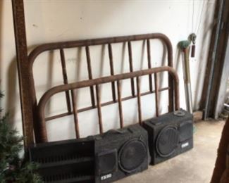 wrought iron bed w/ rails $50.; pair of speakers $20