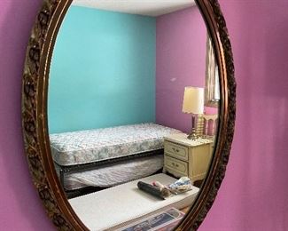 Mid Century oval ornate gold mirror 