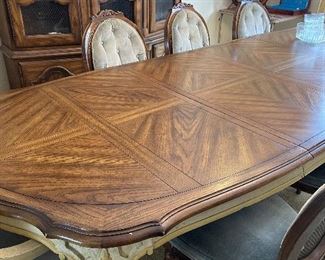 Mid century dining table and chairs (seats 4-10, several leaves included and pads, shown with 2 leaves).  Matching hutch and sideboard  
