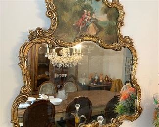 Vintage ornate gold mirror with painted scene detail