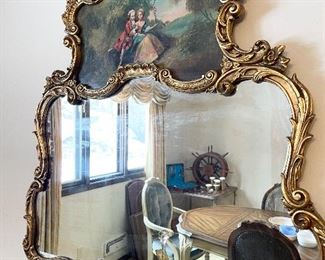 Vintage ornate gold mirror with painted scene detail