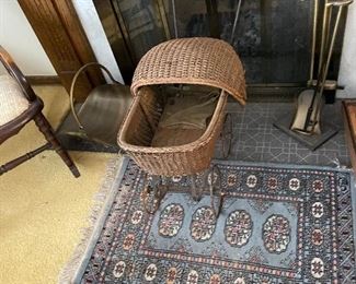 Antique buggy, small rug, fireplace tools 