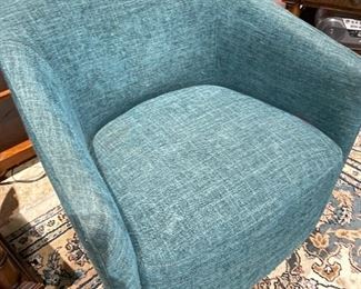 2 swivel chairs beautiful blue thats a shadow on the arm