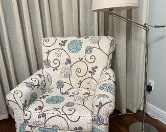 Club chair and floor lamp
