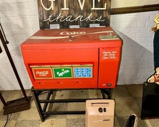 Mid-century Coke vending machine.  Accepting bids during sale.  If unsold, will sell to highest bidder at end of sale.