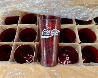 Open box of 72 unused red plastic Coke cups.