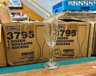 Boxes of champagne flutes.