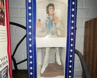 Elvis in white suit whiskey decanter in original box.  Several available.