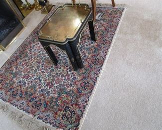 Karastan carpet and antique Asian table