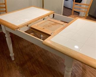 table has built in fold out leaf