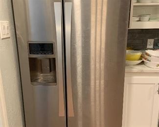 Kenmore stainless steel side by side with water and ice in the door- 2017