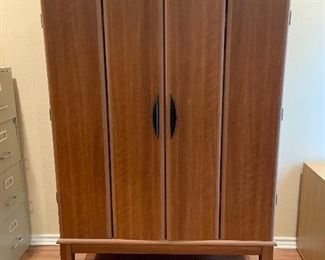 beautiful armoir with under shelving