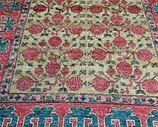Vintage Khotan Rug. Measures 9' 9" x 6' 7". Photo 1 of 3. 