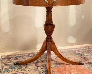 Vintage Drum Table with Brass Claw Feet. Measures 27" D x 27.5" H. Photo 1 of 2. 