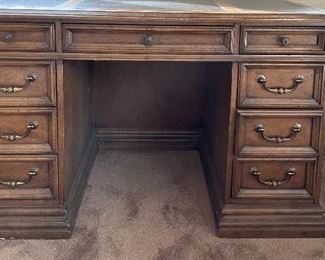 Sligh Leather-Topped Walnut Executive Desk. Measures 48” W x 28” D. Photo 1 of 3. 