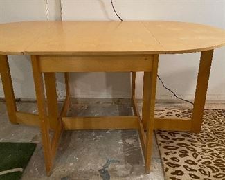 Oak Gate Leg Drop Leaf Space-Saving Dining Table. Measures 26" - 62" W x 36" D x 29.5" H. Photo 1 of 4. 