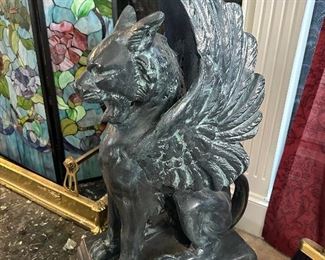  Pair of cast metal Griffins approximately 32”H