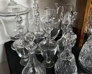 A Variety of Baccarat Decanters with Stoppers