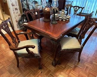 Carved Mahogany finish 
Table 68x44
2 Arm chairs
8 Side chairs 
2 - 18” leaves + all pads