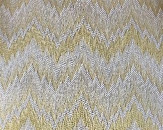 Fabric on pair of matching chairs and pair of bench seats