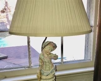 Pair of boy and girl figurine lamps