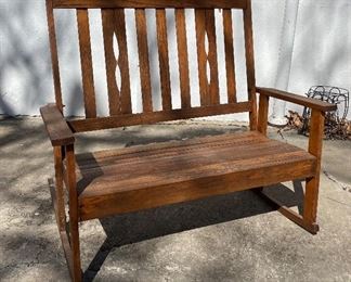 Double rocker. Oak. Very rare. Purchased from a very old home near Berea, Kentucky in the ’70s.  Dimensions: 41.5 in. wide; 3 ft. high; 32 in. deep.