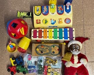 TOYS! Liddle Kiddle tricycle rider, Mini Tonka bulldozer loader, Classic Barrel of Monkeys, Fisher Price 1970 xylophone, Muppet babies activity board, Play Skool wooden cobblers bench, Wooden toy train set, ALF action figure, Shapes ball with all 10 pieces, 1986 micro machines, Army  jeep & field cannon, assorted Hot Wheels, Tootsie Toy Mercedes, Tootsie Toy Firebird,
1990 Hot Wheels beach jeep, Knickerbocker 1955 rubber face black Santa, 3 more tote bins not pictured