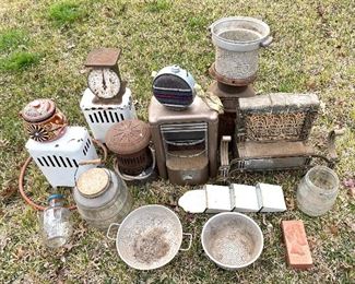 Gas heaters, scale, canteen colanders, and strainers, mail sorter, old barrel jars, refrigerator jars, Lincoln bricks from D’Hanis Brickyard
