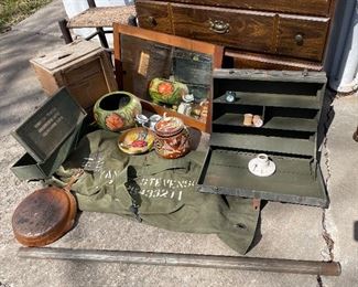 Military duffel bag (+2 more), metal tube for shipping maps, small personal army box, radio operators box set up, Griswold skillets, Mexican pottery, dressers, mirrors 