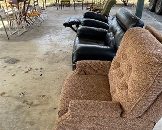 2 matching navy blue recliner chairs. Electrical buttons recline the body and the headrest. Antique rocking chairs, and desks available.