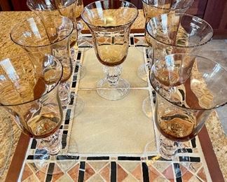 Set of 9 amber wine stems. Tiled bar tray