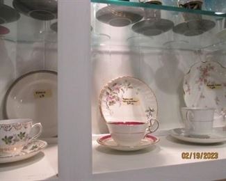 Tea cup and saucer sets.  China plates