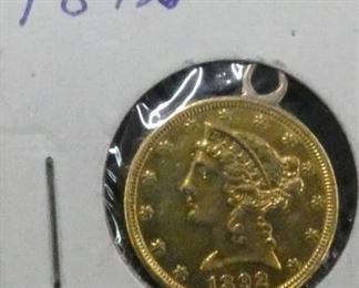 1892 GOLD LIB. HEAD W/ PEZEL