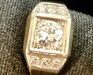 14k ring with over 1kt Diamond. Jewelry and valuables removed daily. Security on premises. 