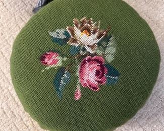 Floral needlepoint stool.