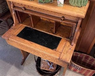 Smaller size oak roll top desk.