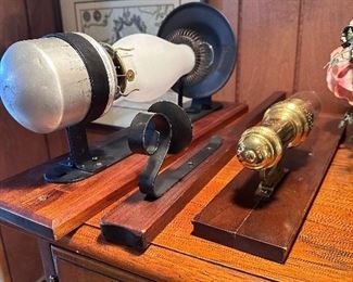 Oil lamp wall sconces.