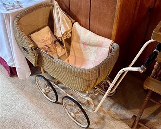Wicker & metal baby doll carriage.