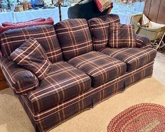 A second 3-section couch in blue plaid.