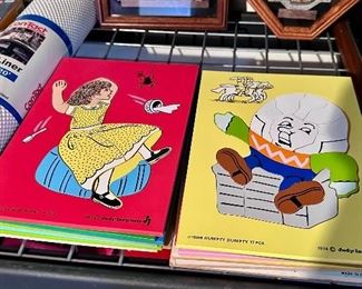 Vintage wooden nursery rhyme puzzles.