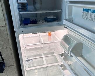 Working Whirlpool refrigerator.