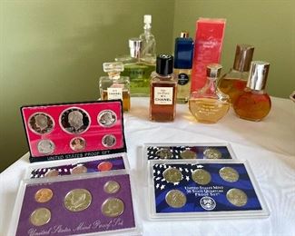 Ladies' perfumes & coin proof sets.